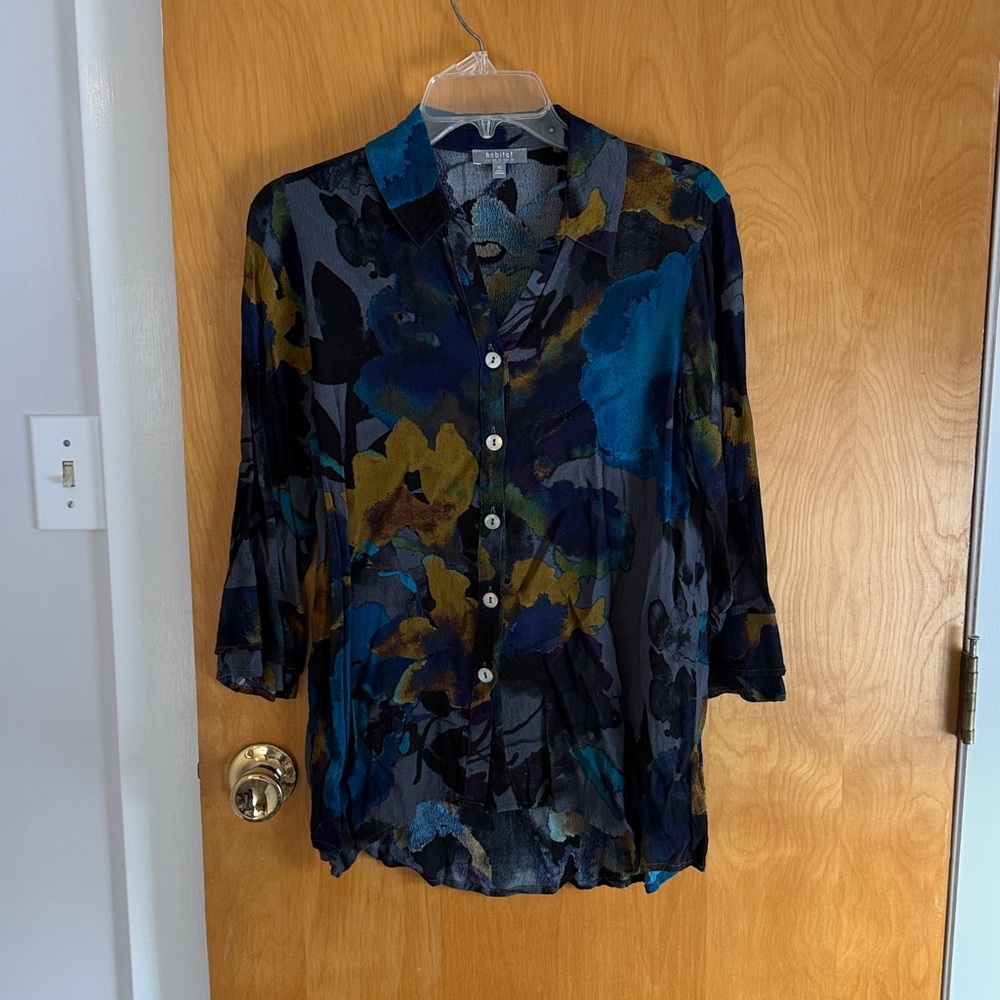 Colorful floral blouse.
